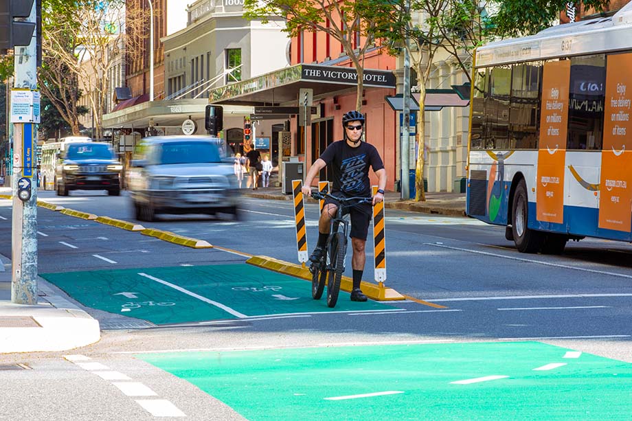 guy-riding-bike-brisbane-city-advocacy