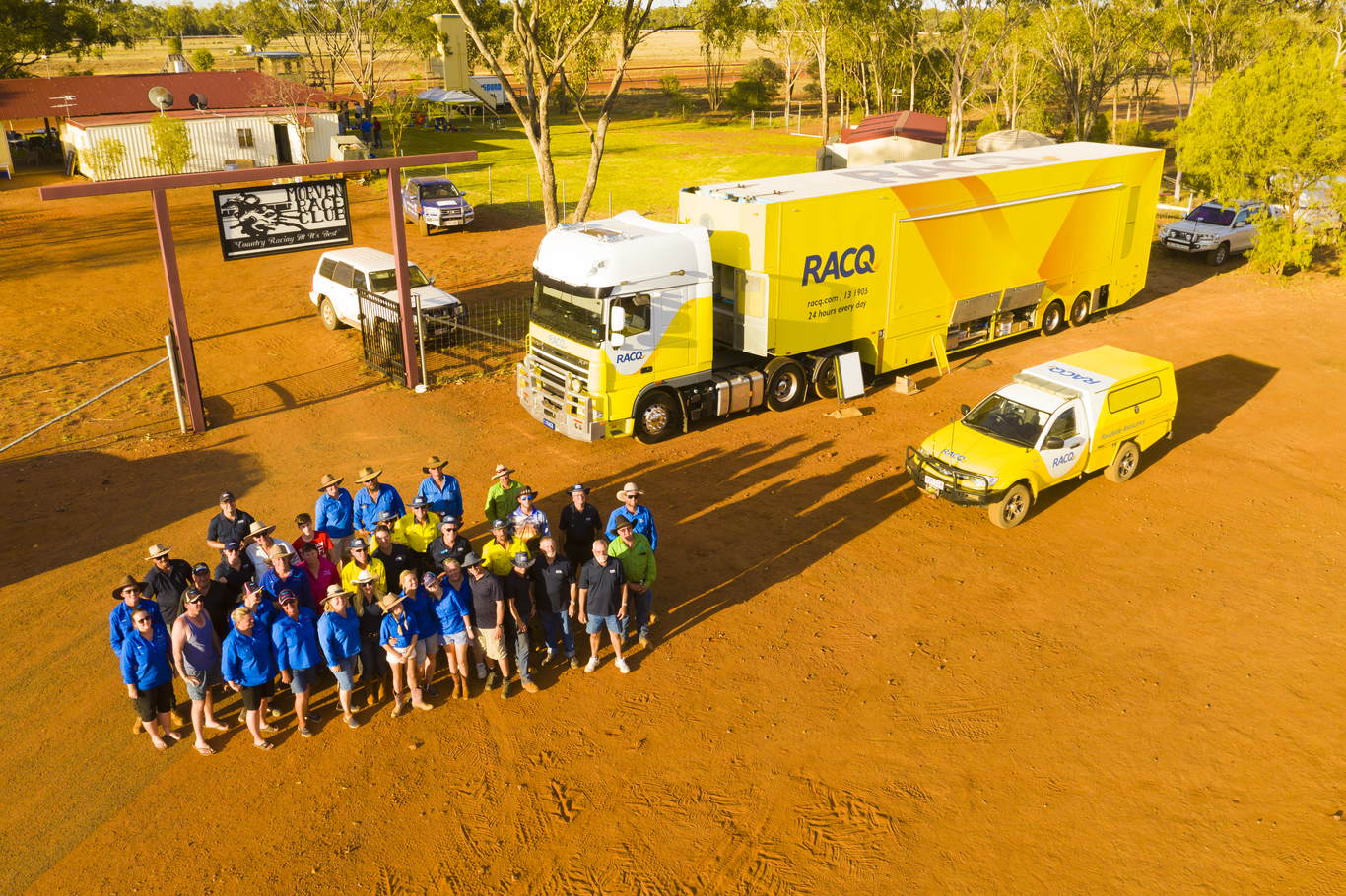 racq-people-standing-in-front-of-truck