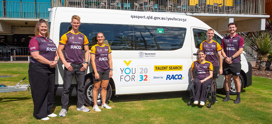 qas people smiling in front of qas branded van