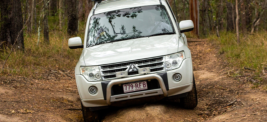 car driving through dirt