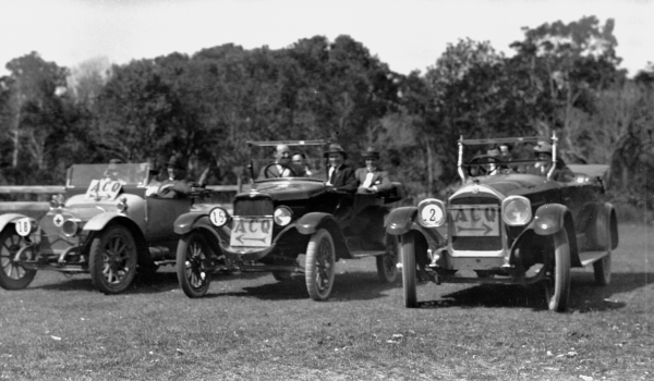 black and white negative of three vintage cars