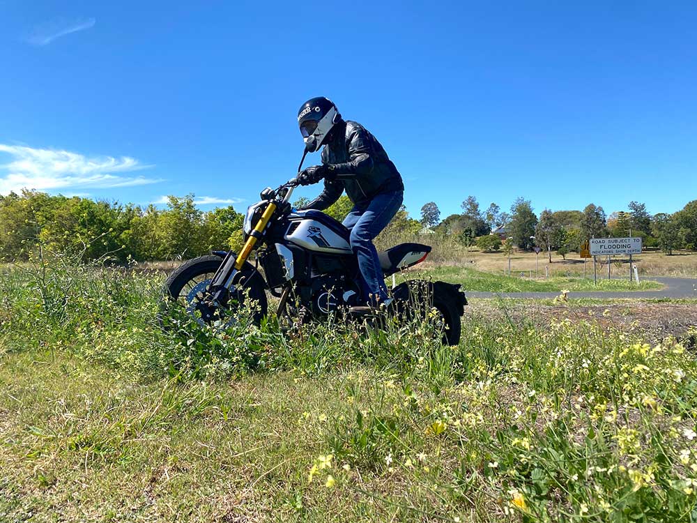 CFMOTO 700CL-X Heritage being ridden off-road.