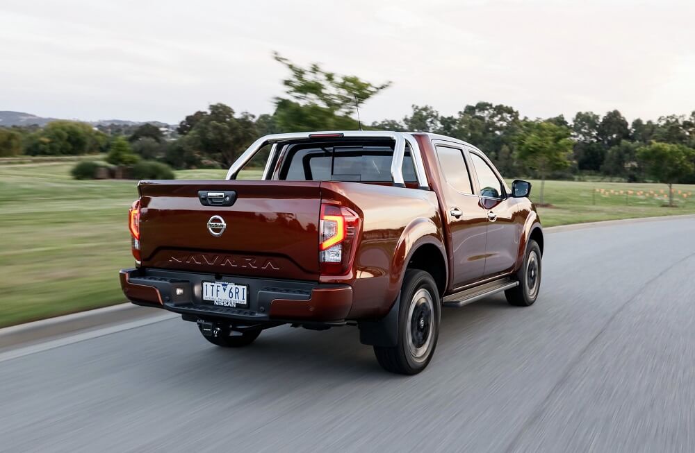 MY21 Nissan Navara - ST-X back of car driving