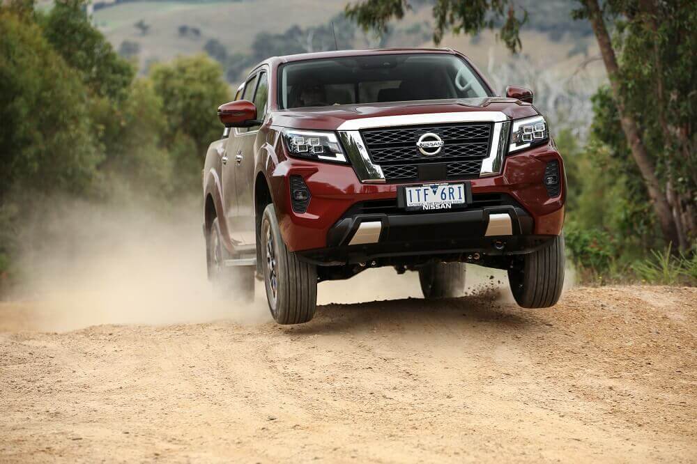 MY21 Nissan Navara  STX 74 driving on road