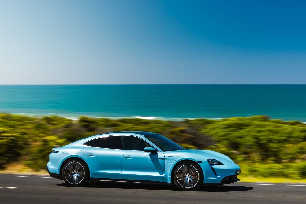 Porsche Taycan 4S EV side view.