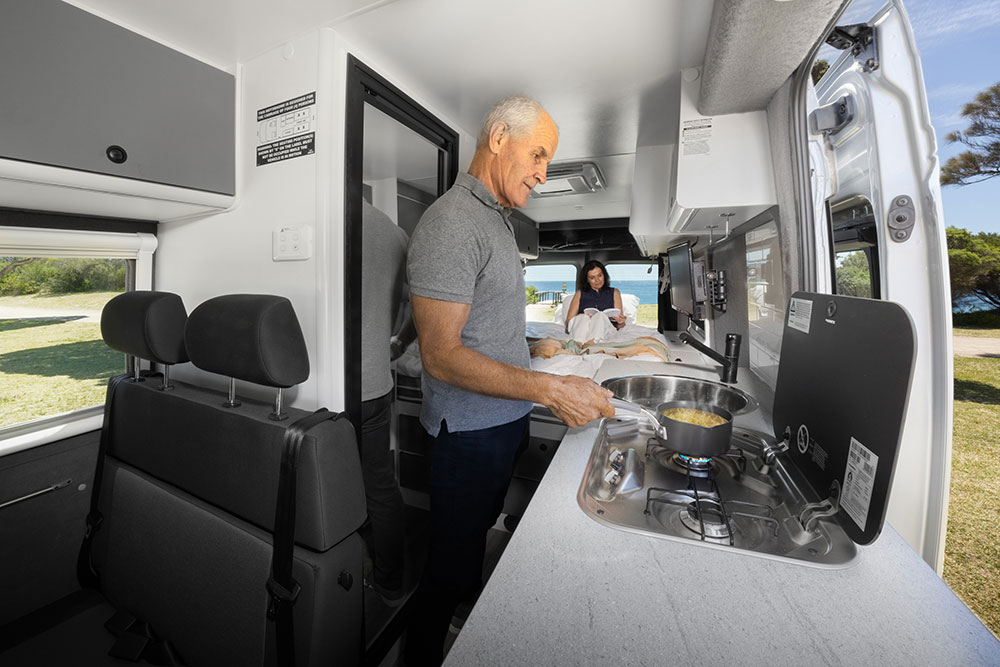 Cooking in the 2024 Volkswagen Crafter Kampervan.