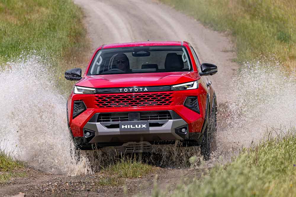Toyota HiLux Rogue being driven through water.