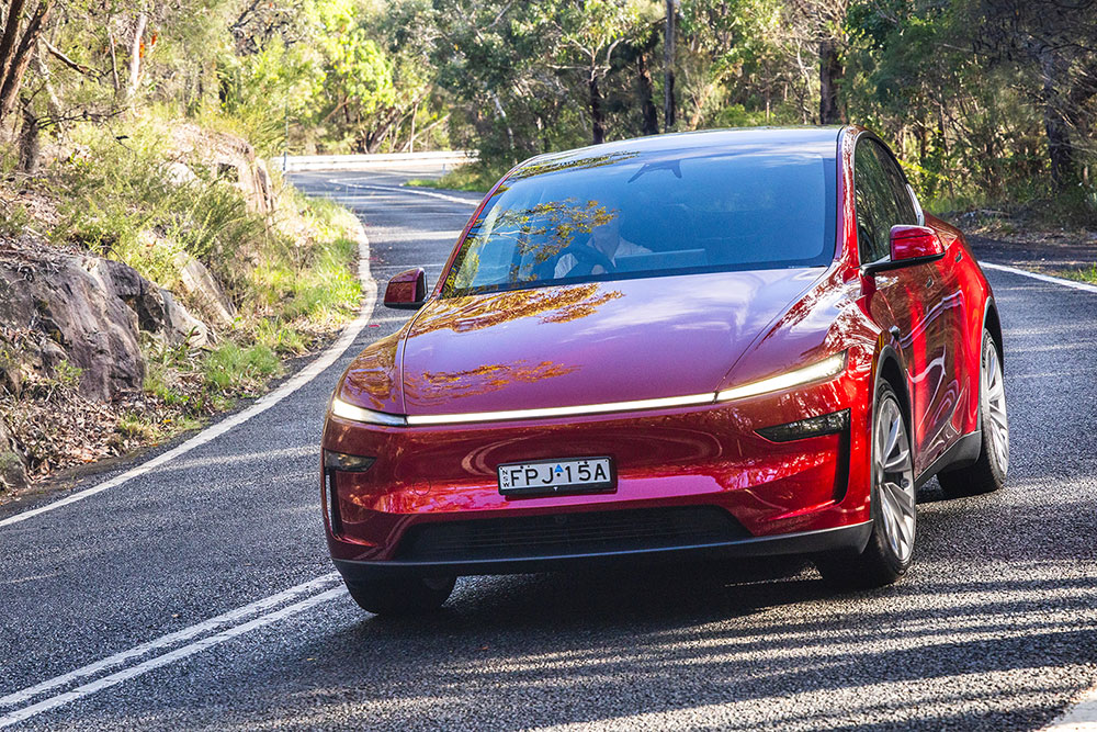 2025 Tesla Model Y on the road.