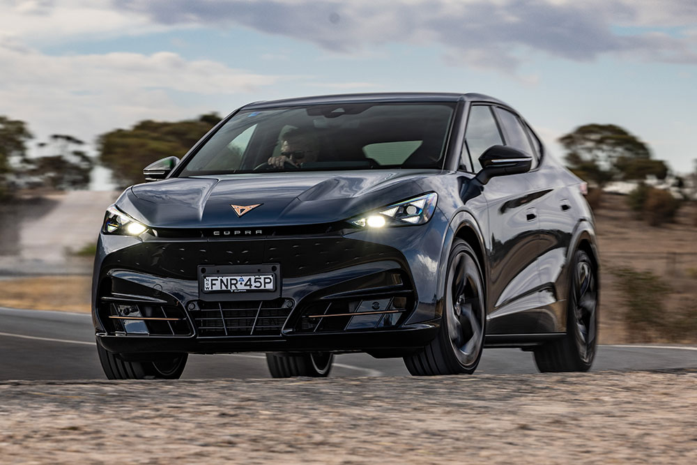 Cupra Tavascan VZ on the road.