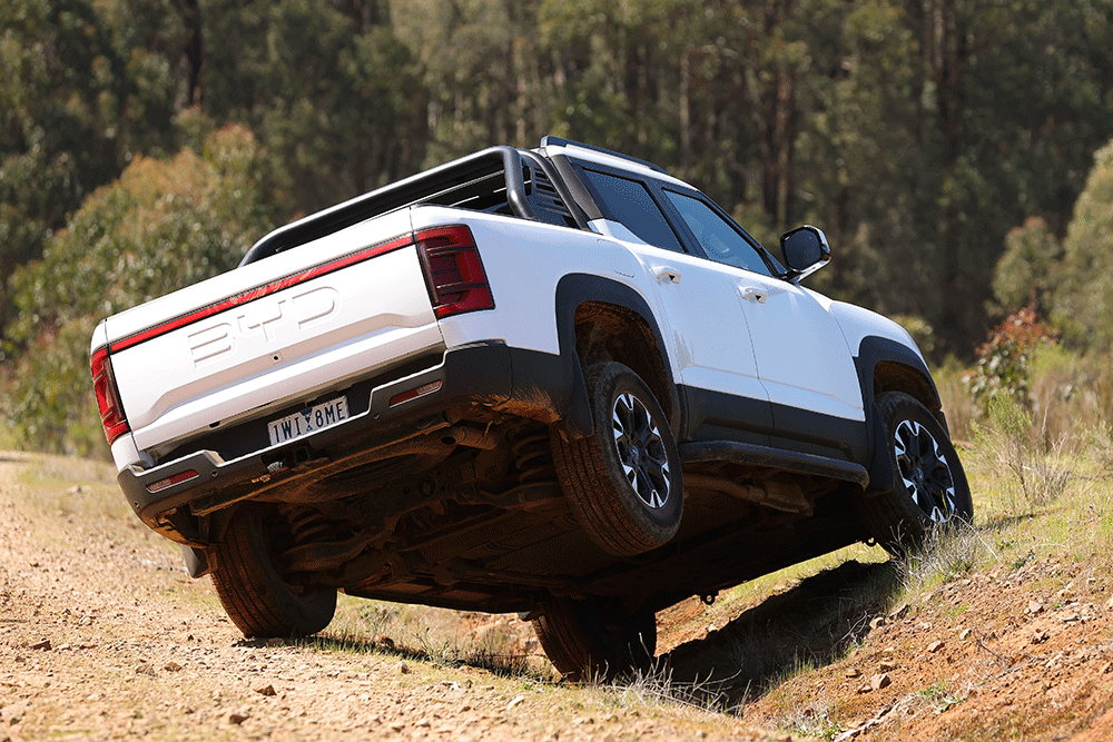 BYD Shark 6 drives across a deep gully.