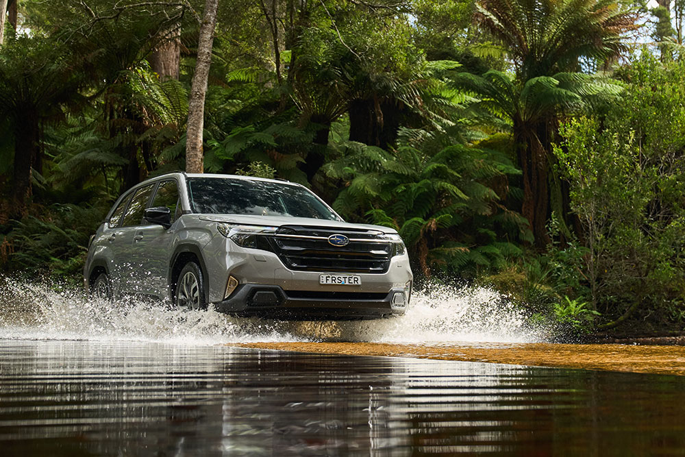 Forester AWD Hybrid Touring crossing a creek.