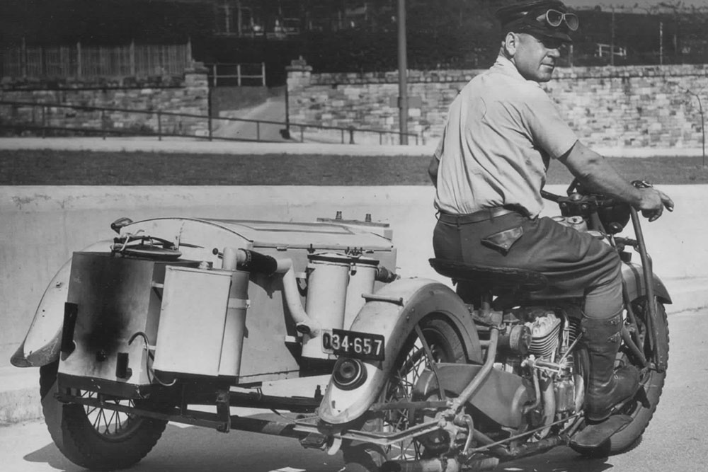 RACQ patrol motorcyle converted to run on charcoal gas due to petrol rationing in  World War II.