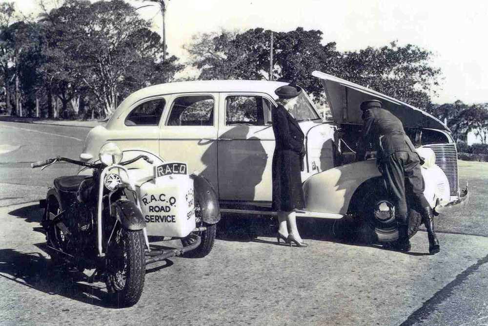 RACQ patrol officer helping a stranded motorist in 1947.