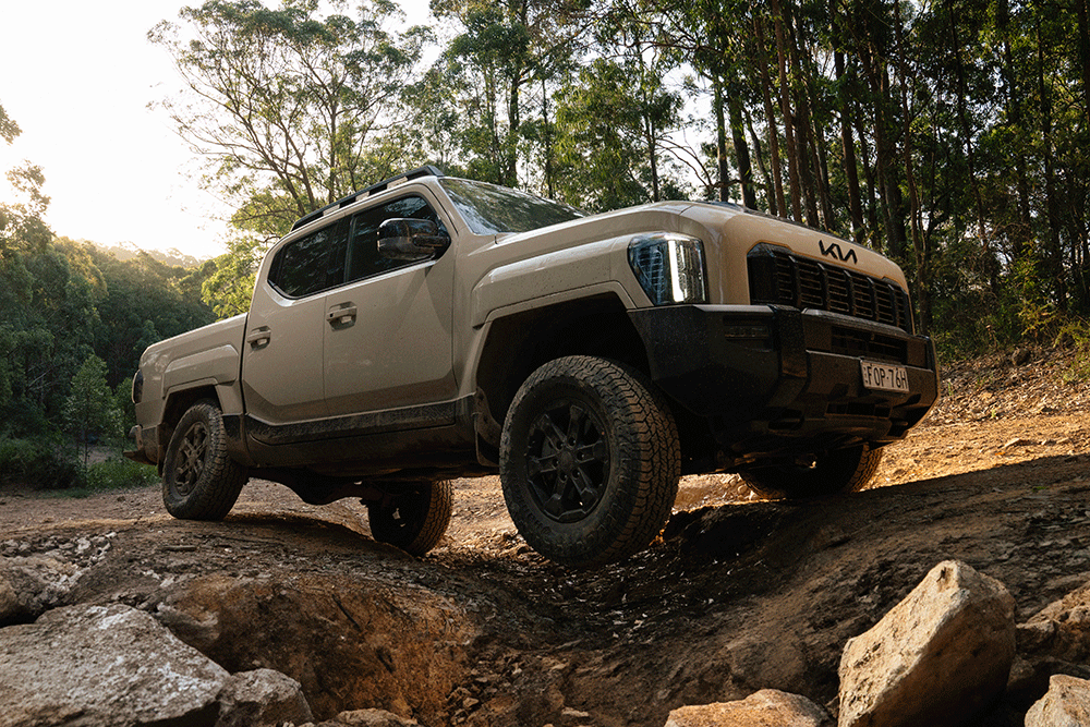 Kia Tasman ute goes off-road.
