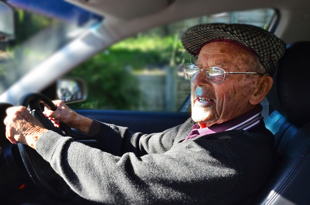 Elderly driver behind the wheel