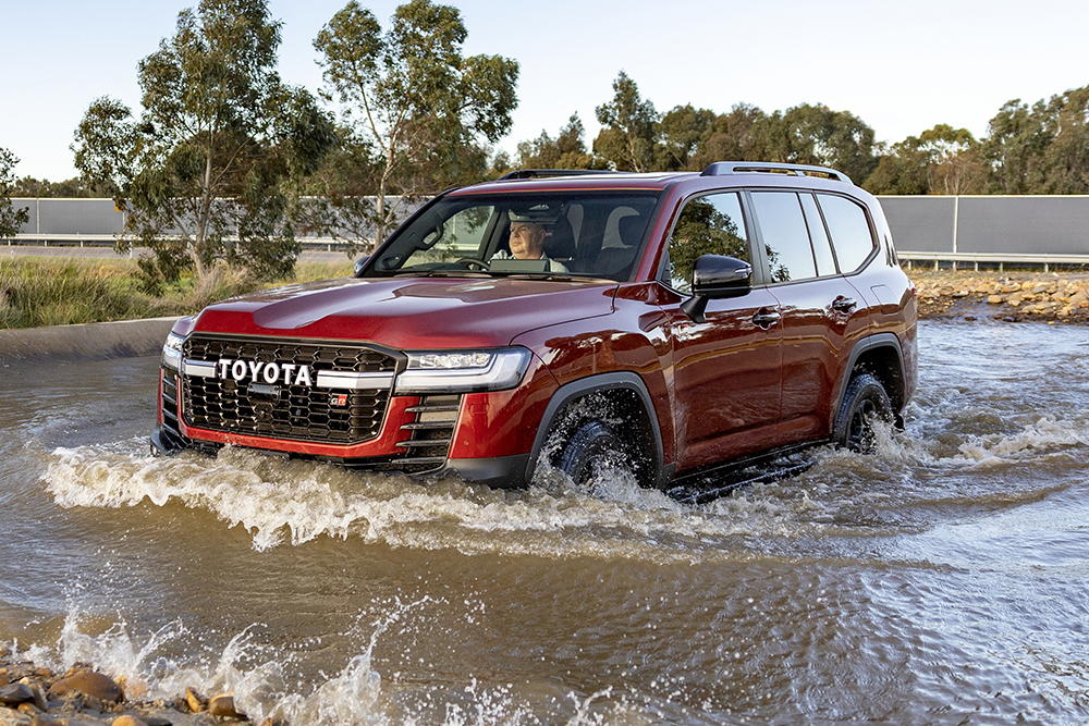 Toyota LandCruiser going through water.
