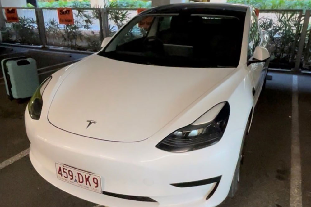 Tesla rental car.
