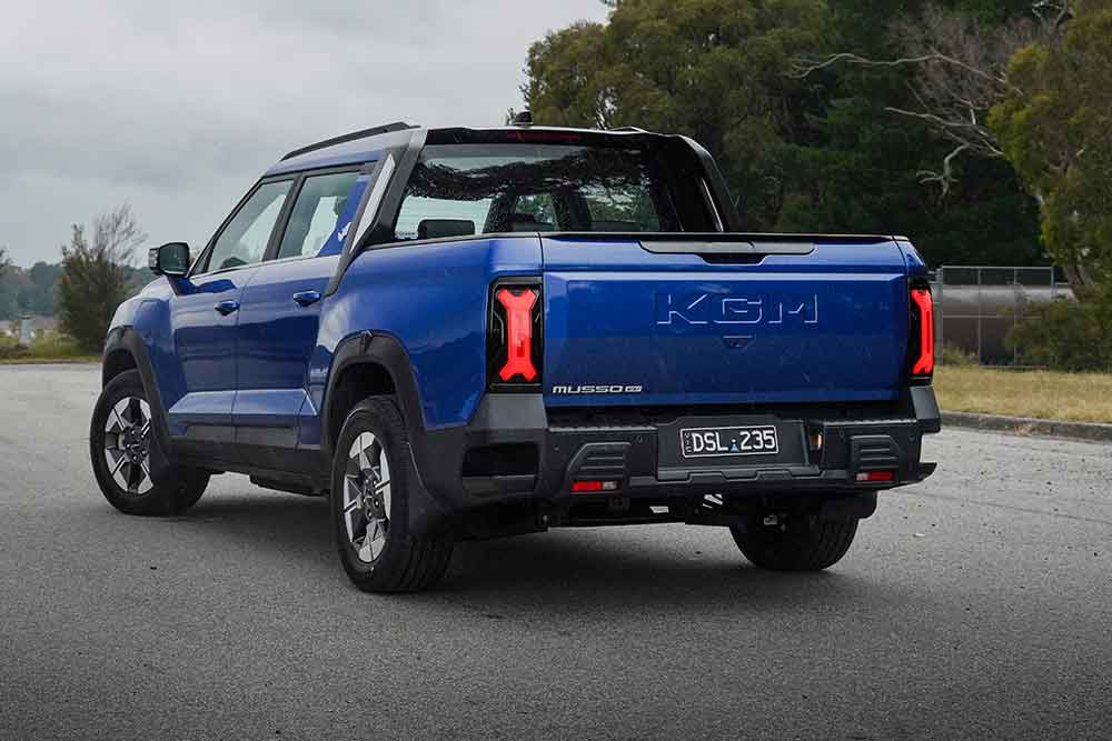 Rear view of KGM Musso ute.