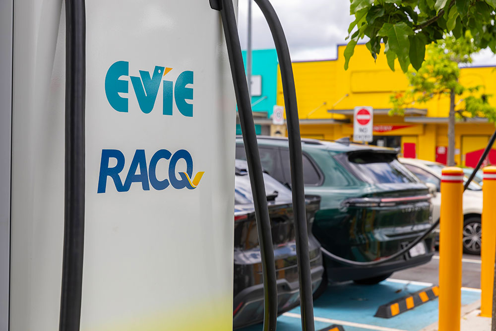 Evie charging station with RACQ branding.