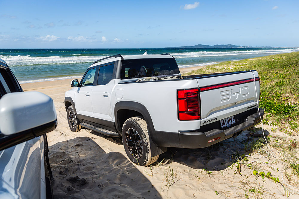 Power cord running from Shark 6 PHEV ute to power appliances.