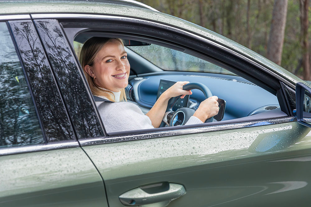 Driver behind the wheel of an EV at RACQ test drive day.