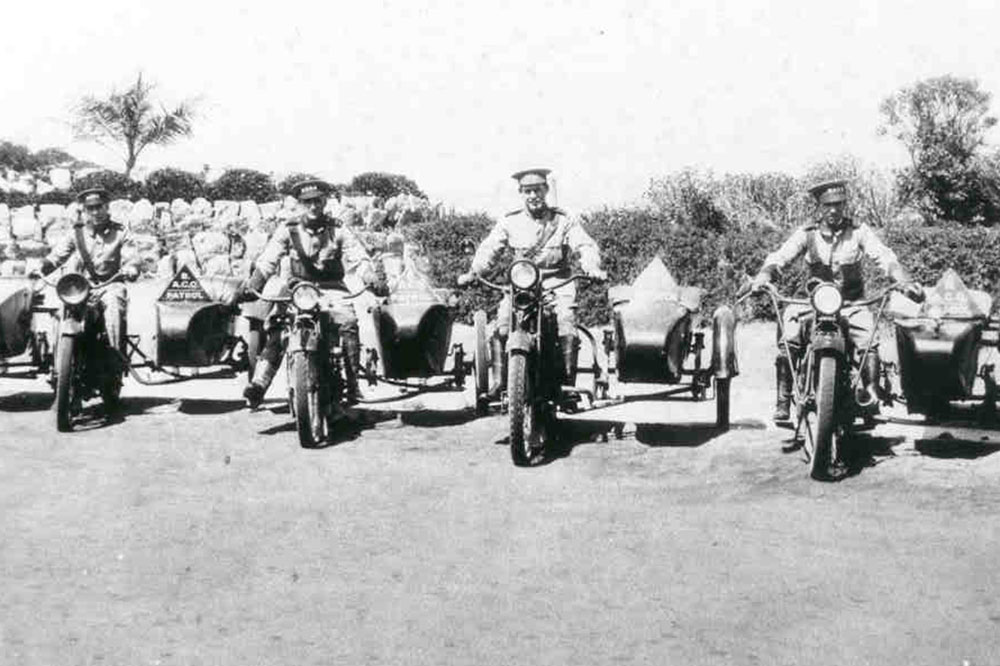 A photo taken in 1926 of RACQ patrols including the two originals, George Clark (third from left) and Eddie Henderson (fourth from left).
