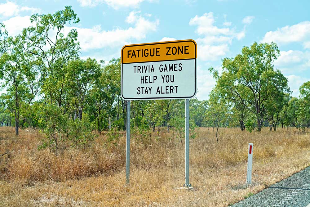Sign promoting trivia games on a Queensland road