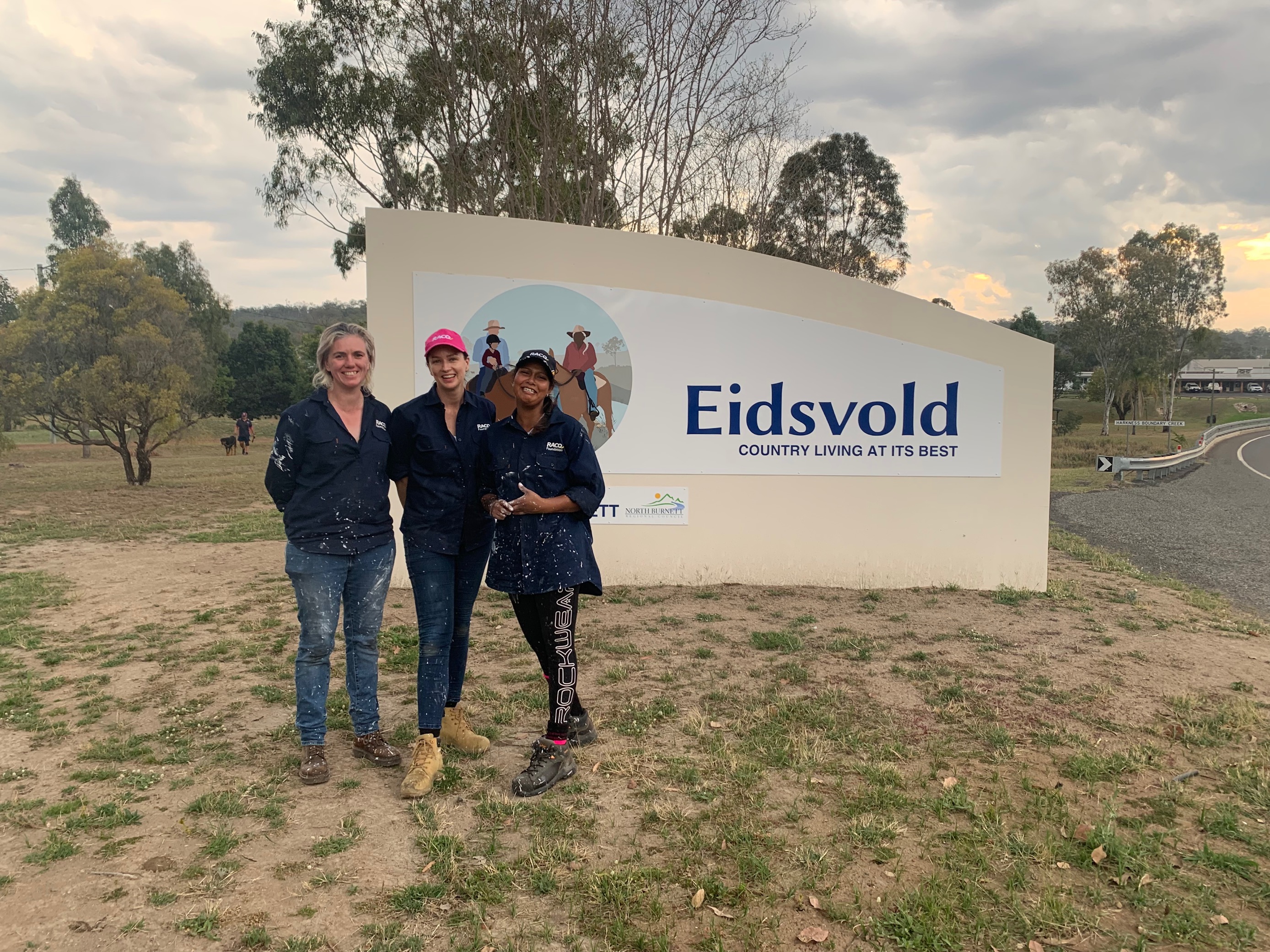Foundation volunteers in front of Eidsfold sign