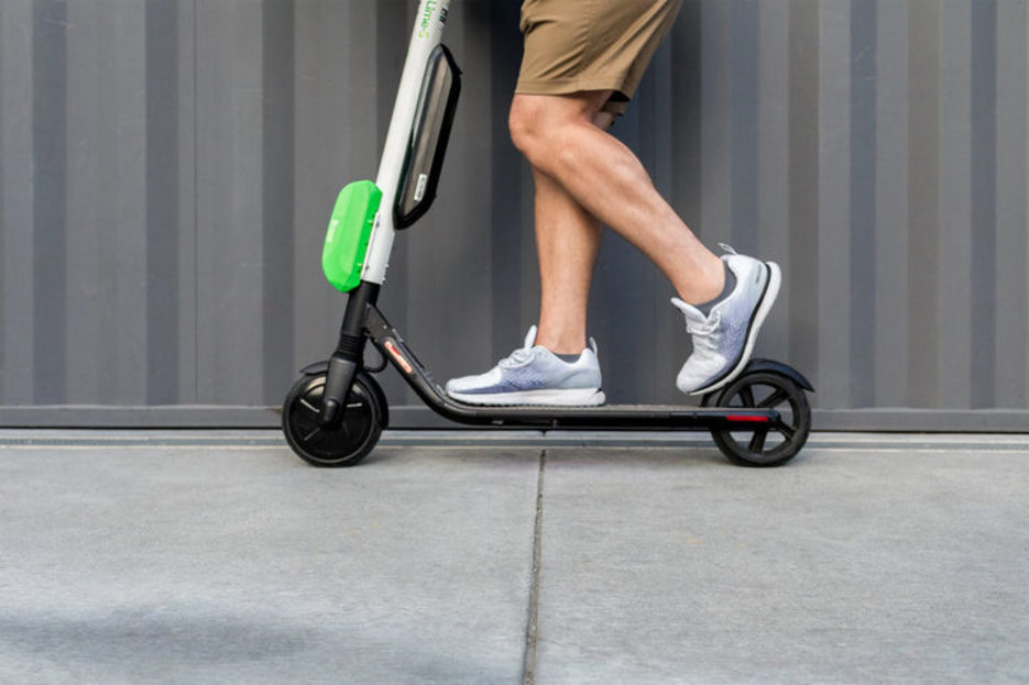 Man riding an electric scooter