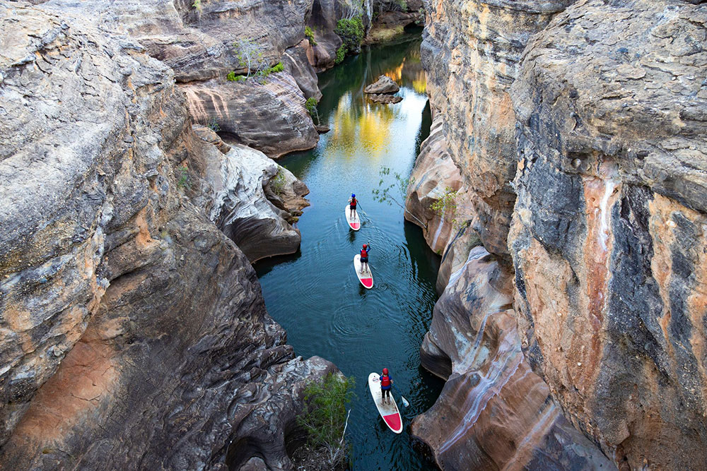 Standup paddelboarders at Cobbold Gorge.