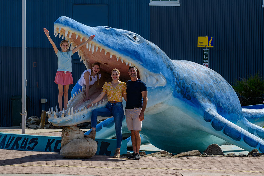 A family checks out an exhibit at Kronosaurs Korner.