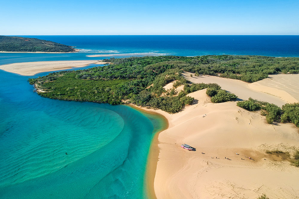 LARC! Tours’ bright pink amphibious vehicle leaves the water.