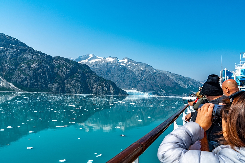 Tourists enjoying the early morning view of Glacier Bay National Park and Preserve, Alaska, USA.