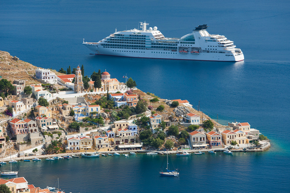 Cruise ship in the bay Gialos Symi Greece
