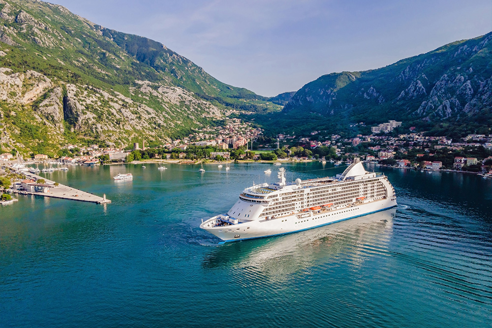 Luxury passenger liner in the bay of Kotor with travel returning after the Covid 19 pandemic Portrai