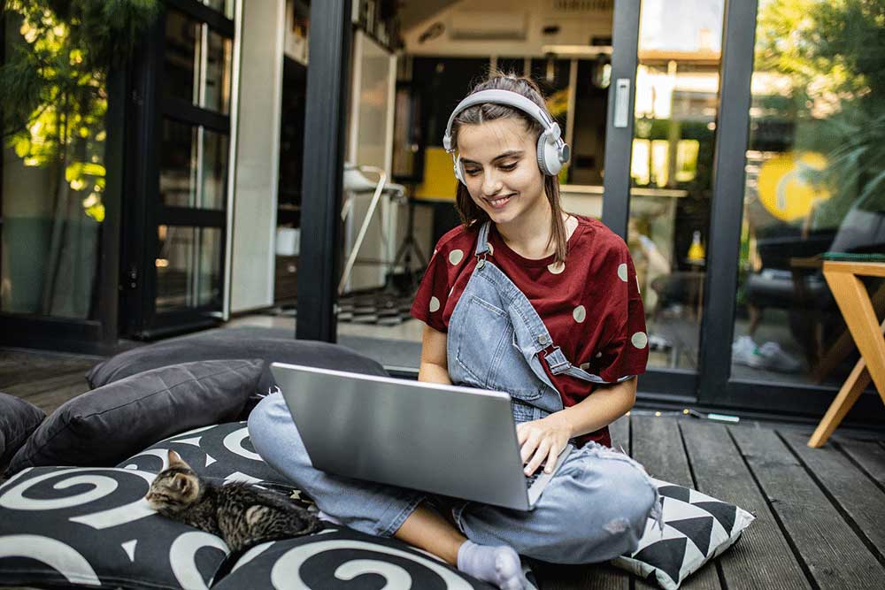 Young girl on a laptop.