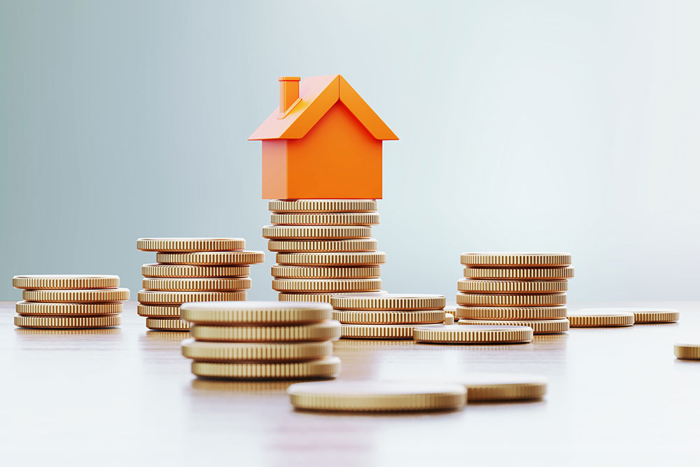 Toy house and gold coins.