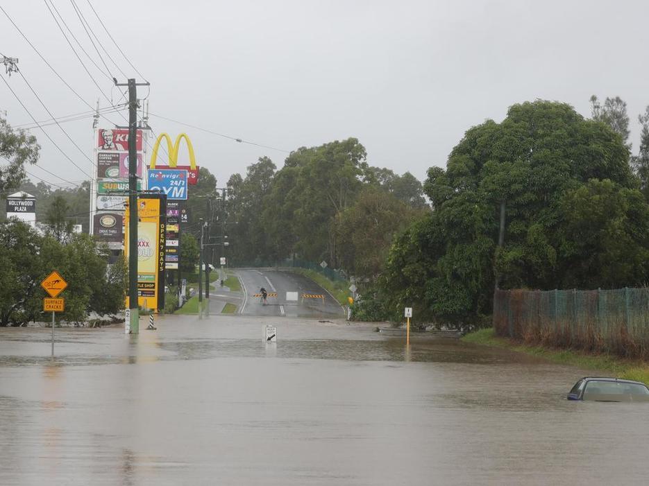 Flooded street. Picture credit: Courier Mail