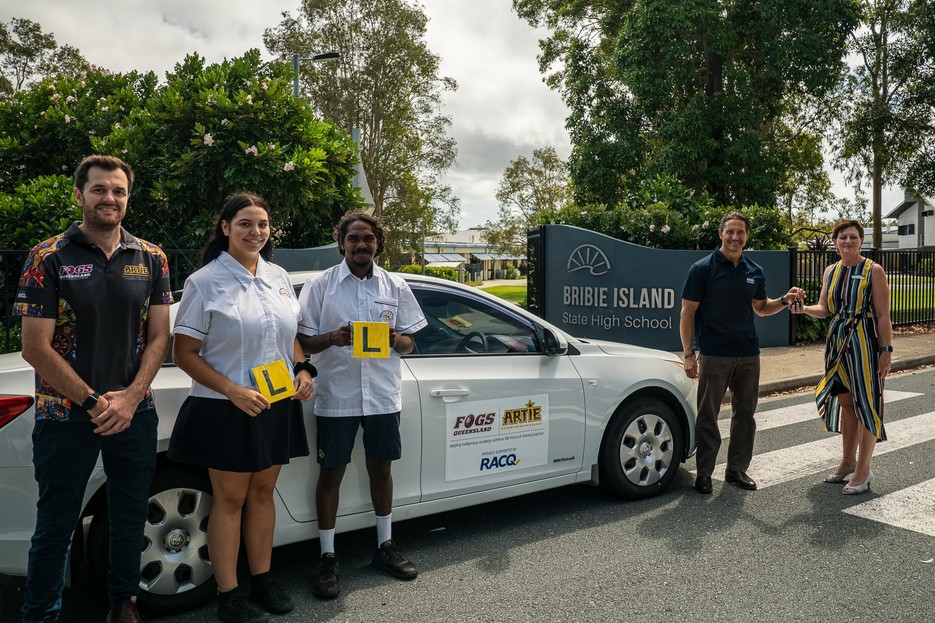 Students from Bribie High with car presented by FOGs and RACQ