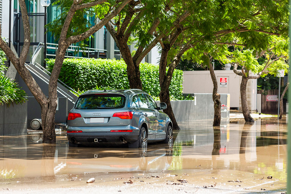 A car on a Brisbane street during 2022 Brisbane flood.