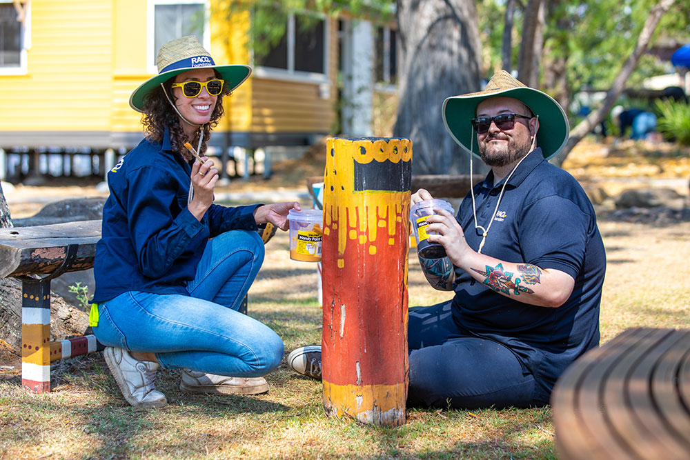 RACQ Foundation volunteers  painting in Cherbourg.