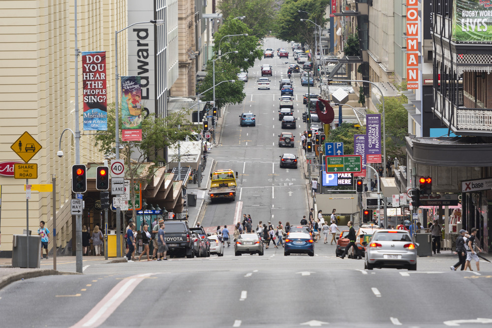 Inner city street in Brisbane with people and cars
