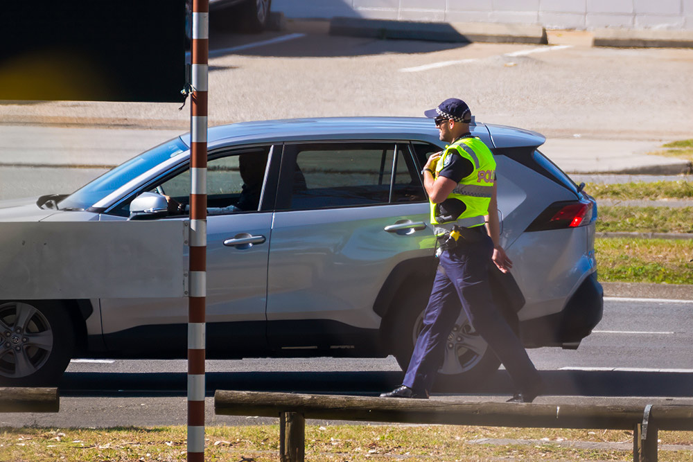 Police pulling over driver