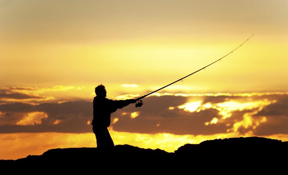 sunset with fisherman