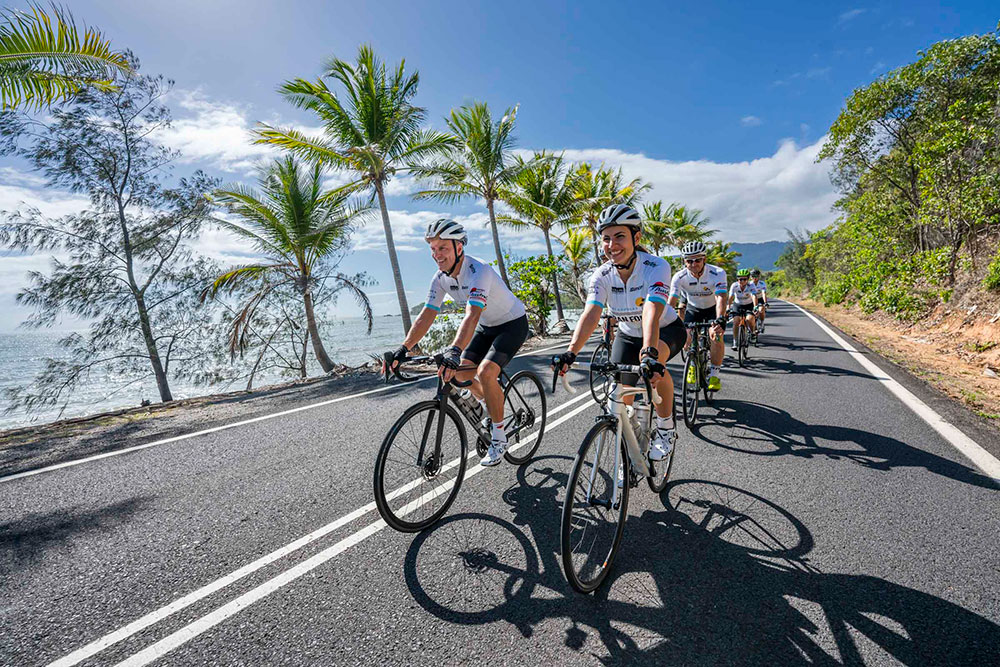 Cyclists on the Great Barrier Reef Drive, heading towards Port Douglas.