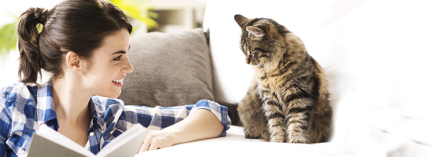 woman caring for her cat
