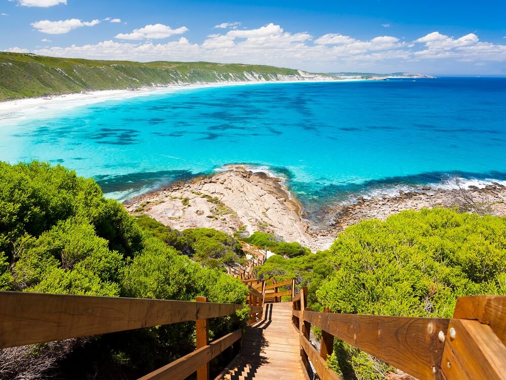 Wooden steps leading down to a West Australian beach.