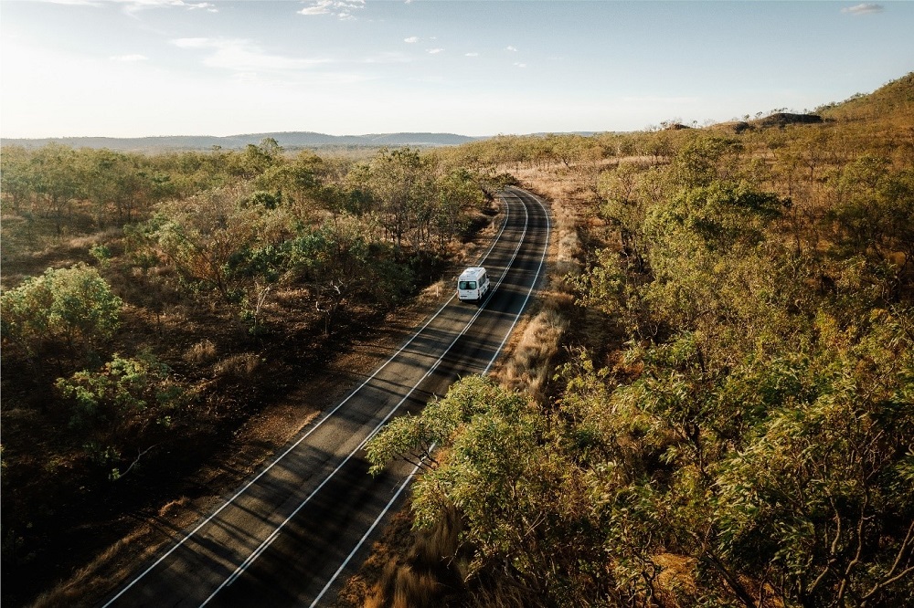 Apollo van driving down country road