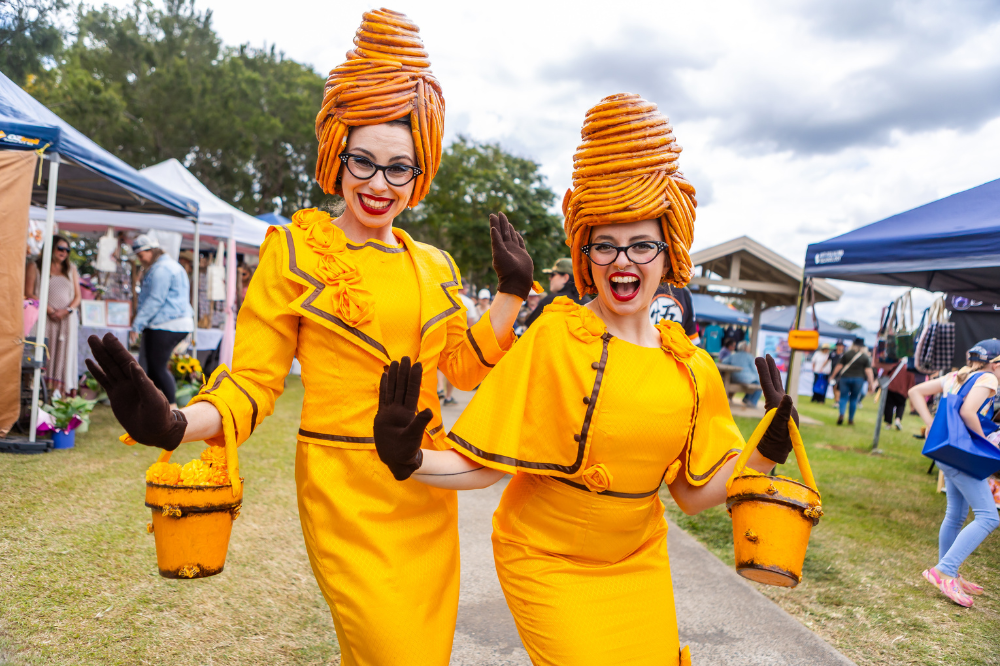 Two women dressed as beehives at the Laidley Spring Festival.