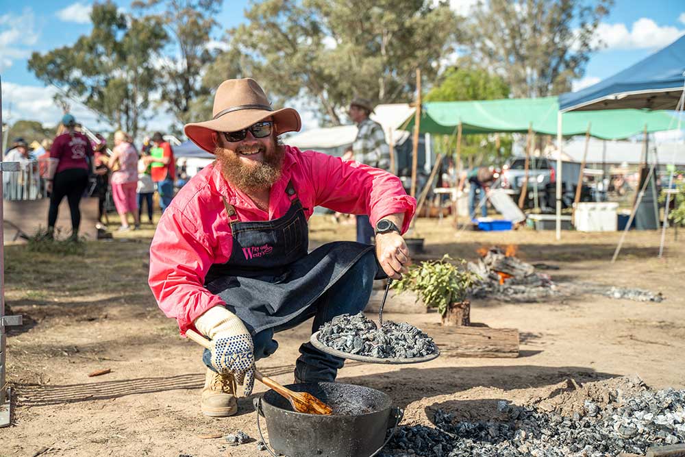 A man ready to check is cooking at the Australian Camp Oven Festival in Millmerran.